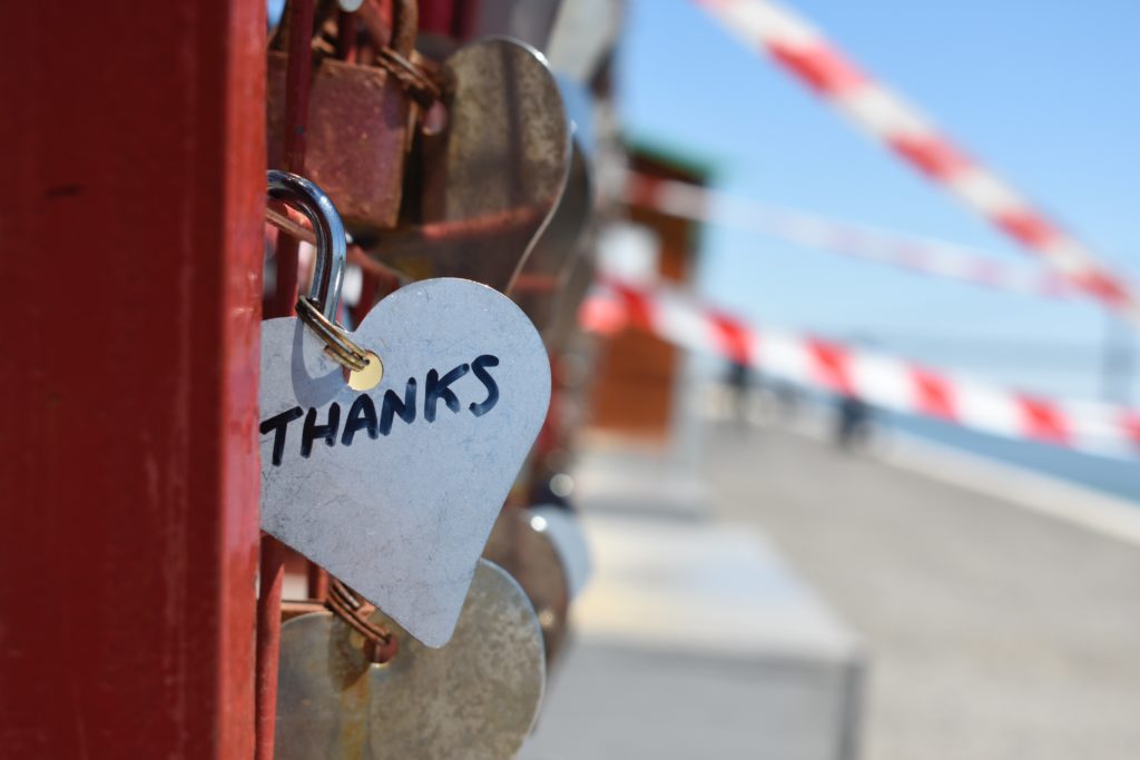 silver colored lock heart on bridge